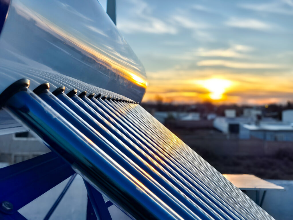solar hot water tank at sunset